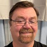 Headshot of Tom Stark